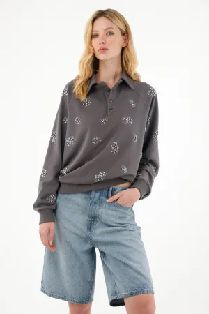 Buzo gris oversize con apliques de brillo para mujer